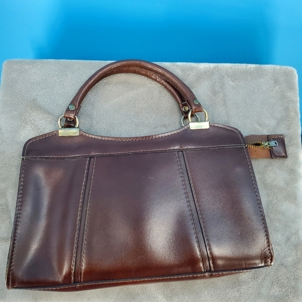 Vintage brown leather handbag by Reem